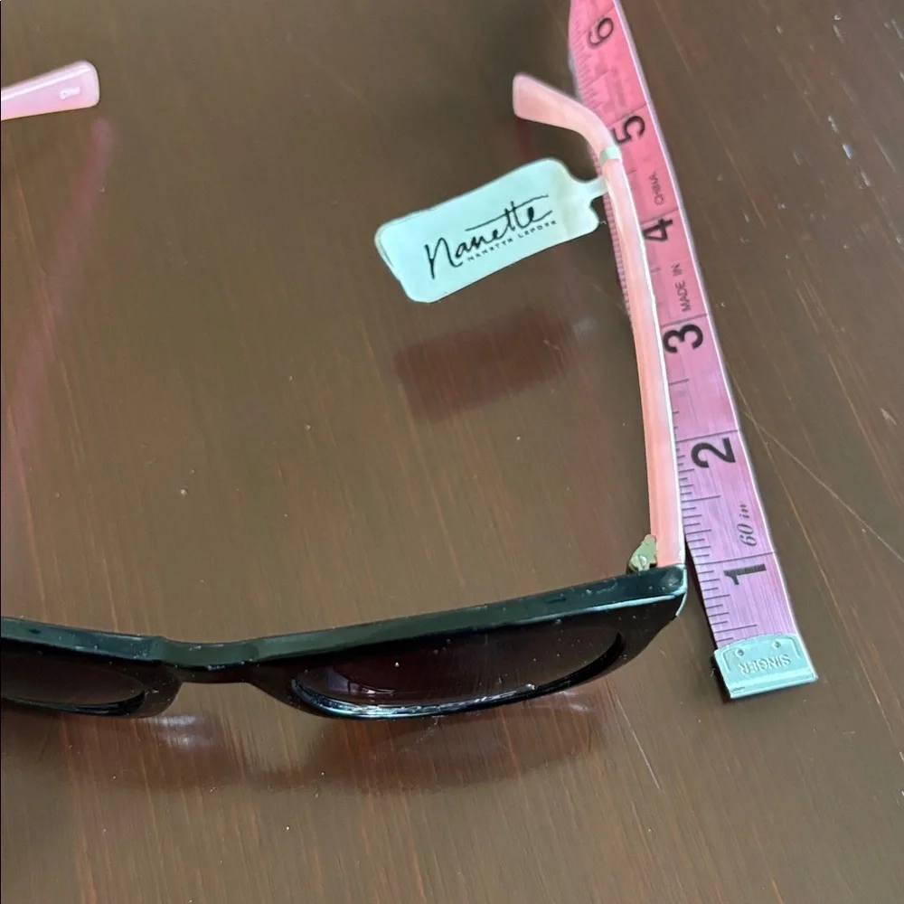 Nanette Lepore 100% UV protection,pearl pink arms,black round/square frame,NN157
